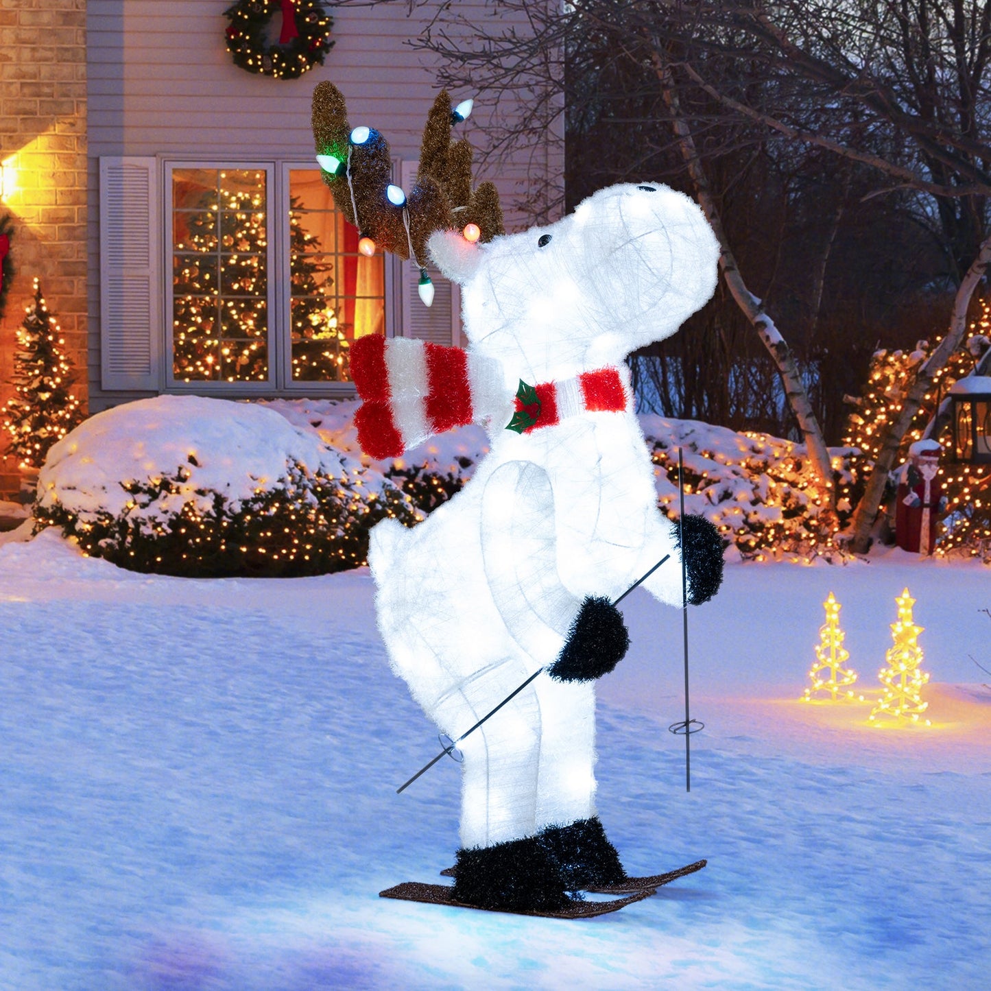 44-inch DirectDeals animated skiing reindeer, pre-lit white figure with antlers and scarf on Tampa Home & Garden Store