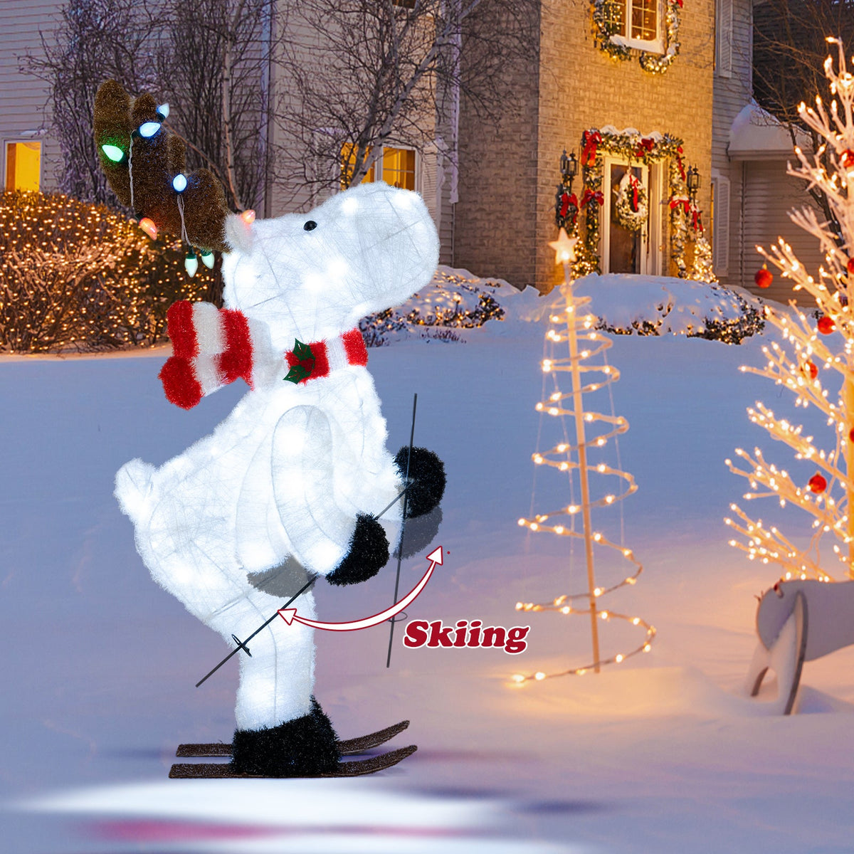 44in Animated Christmas Reindeer Skiing Decoration, white pre-lit with red scarf and antlers on Tampa Home & Garden Store