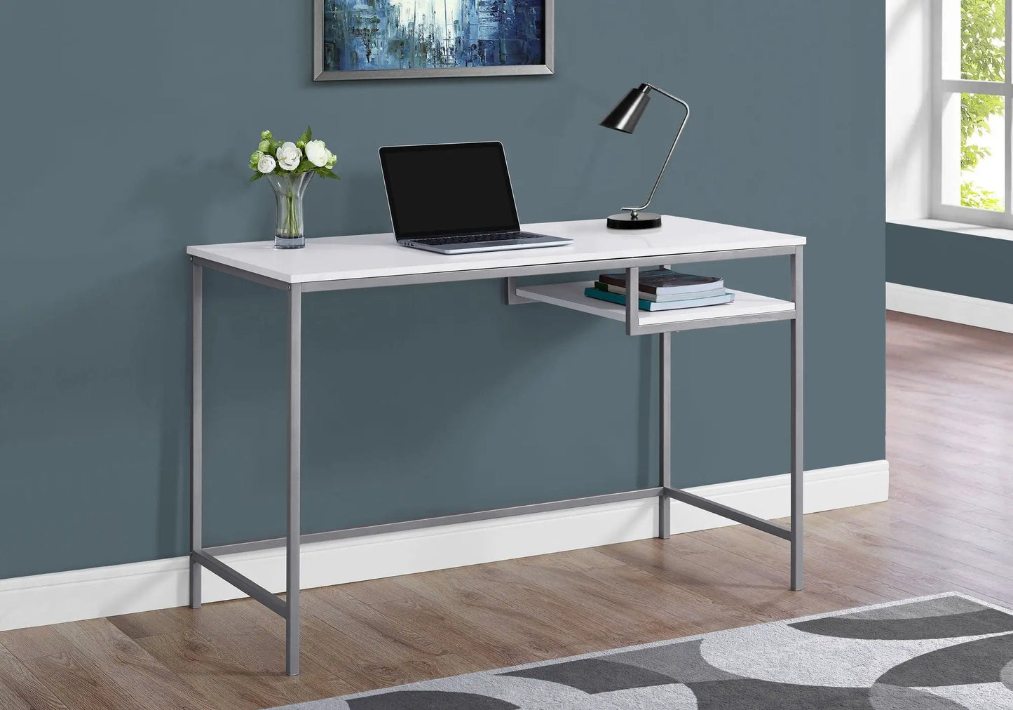 Computer desk by Unique Piece Furniture with white top and metal frame; laptop and lamp on desk on Tampa Home & Garden Store