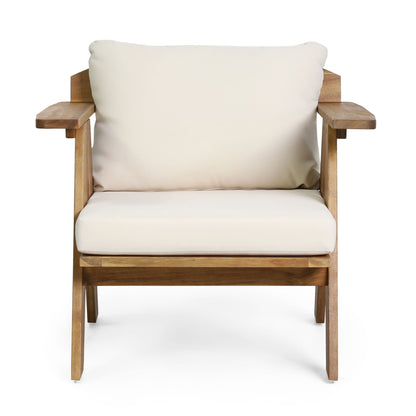 Outdoor acacia wood club chair with beige cushions on Tampa Home & Garden Store