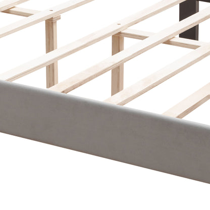 Queen platform bed frame in gray upholstered finish with exposed wood slats and supports on Tampa Home & Garden Store