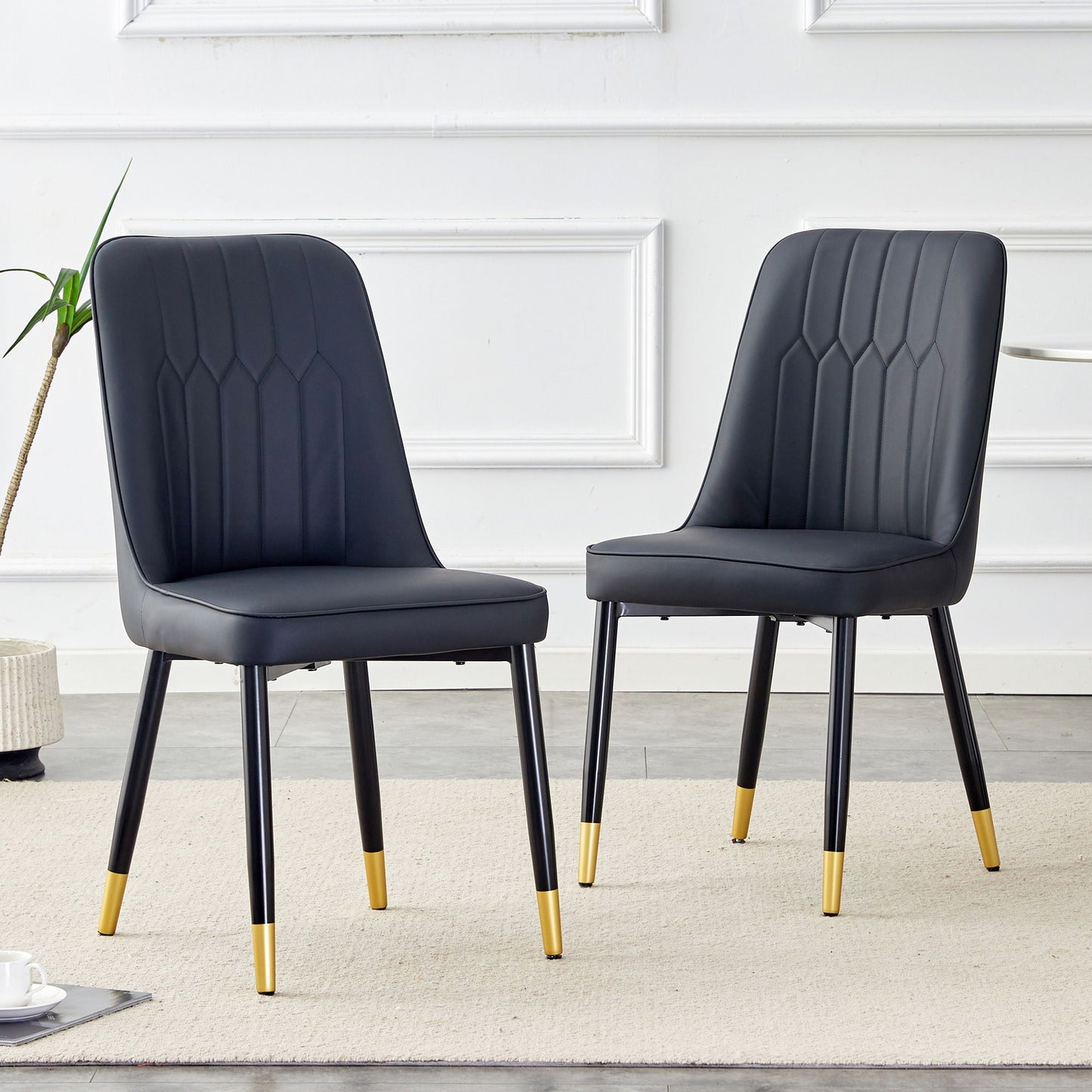 Modern black chair with metal legs and yellow-tipped feet, two-chair kids set on Tampa Home & Garden Store