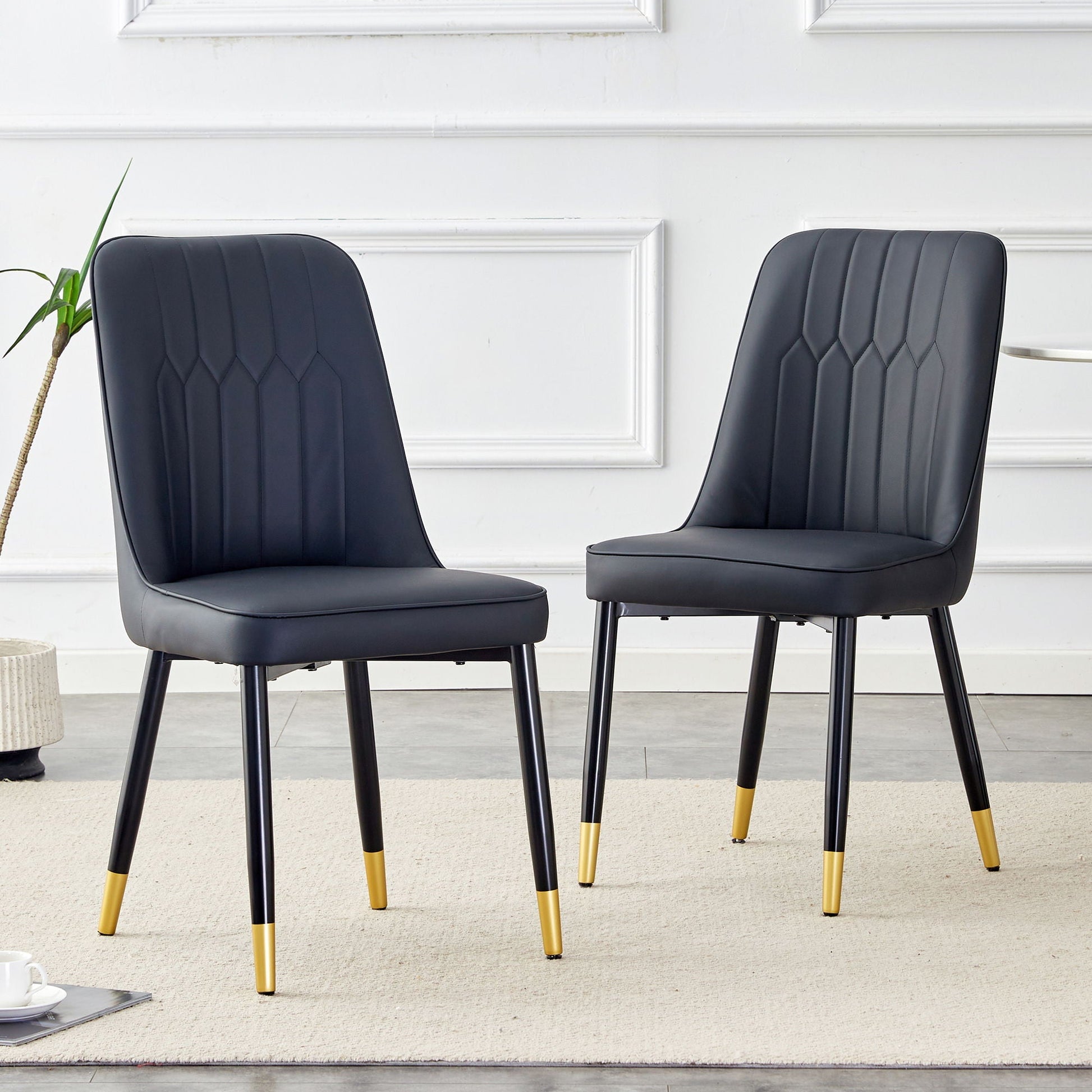 Modern black chair with metal legs and yellow-tipped feet, two-chair kids set on Tampa Home & Garden Store