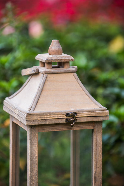 Ivory wooden candle lantern with glass panels and decorative top on Tampa Home & Garden Store