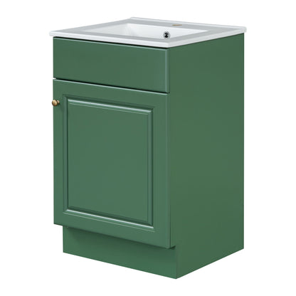 Bathroom vanity with white sink atop a green cabinet featuring brass knob hardware HouseOfZazla on Tampa Home & Garden Store