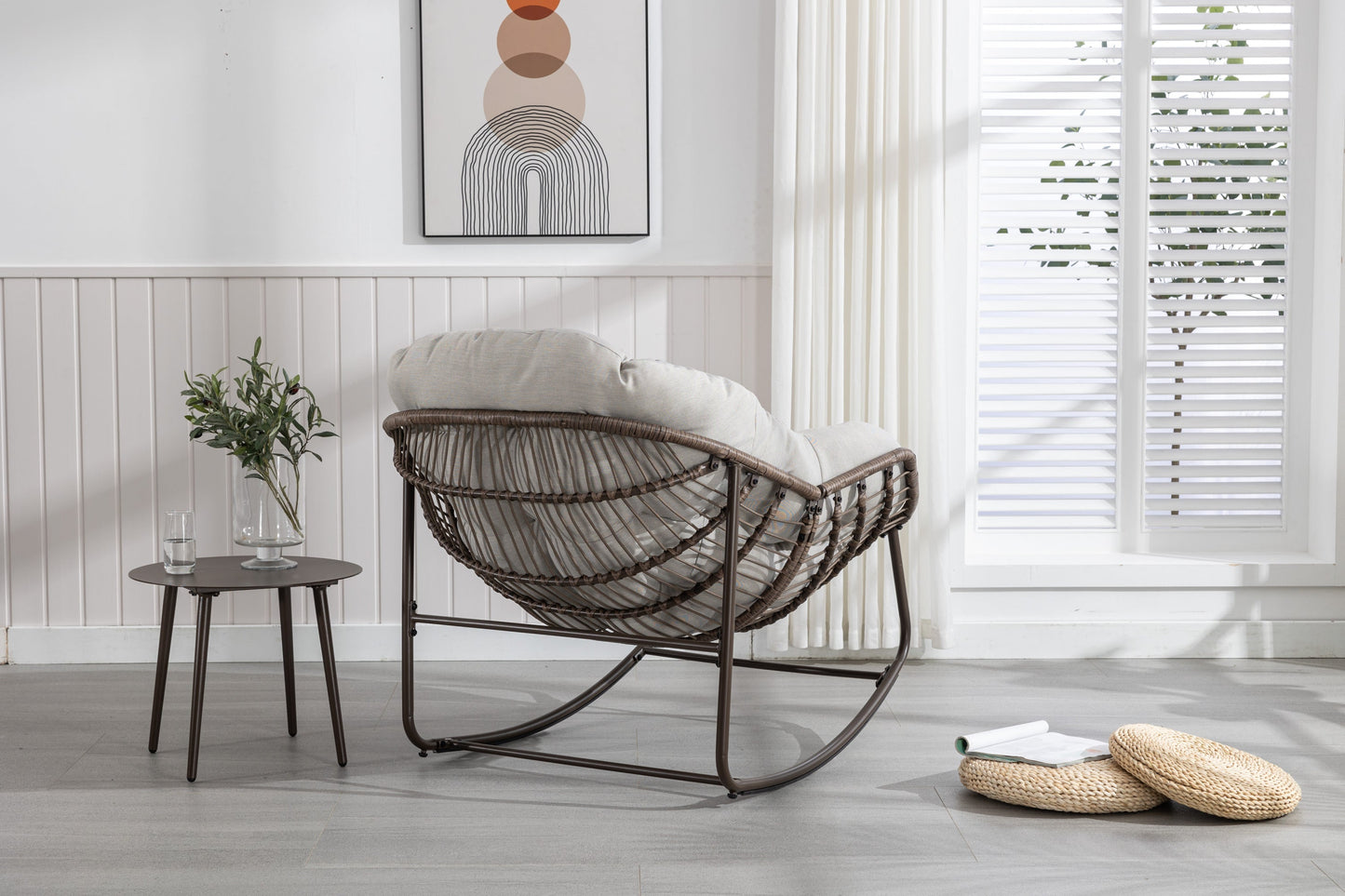 HouseOfZazla outdoor rattan rocking chair with beige padded cushion on Tampa Home & Garden Store