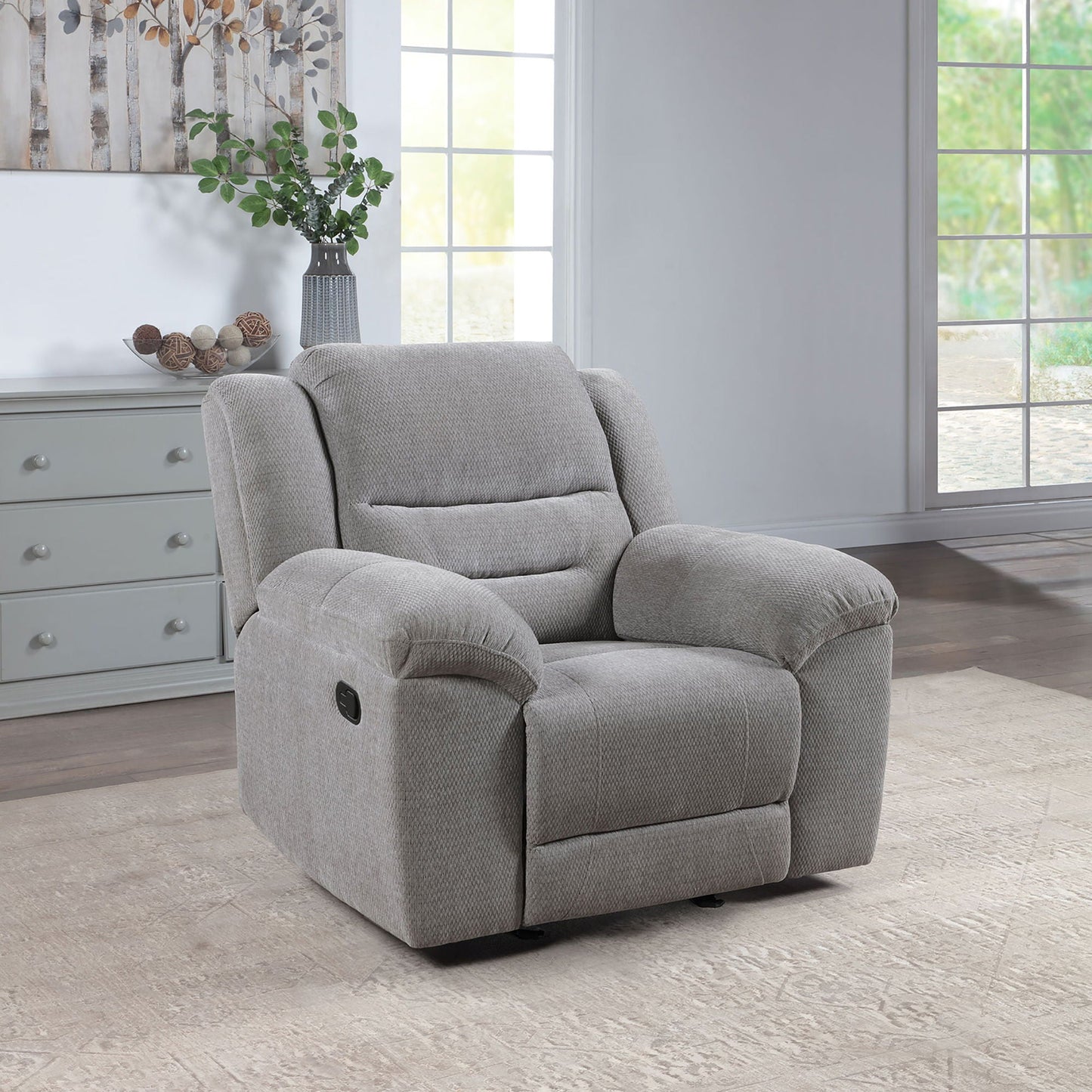 Sebring gray fabric glider recliner chair with manual recline in a cozy living room on Tampa Home & Garden Store