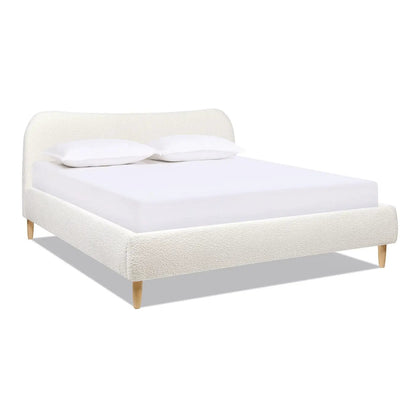 Roman curved headboard upholstered platform bed in ivory boucle with wooden legs on Tampa Home & Garden Store