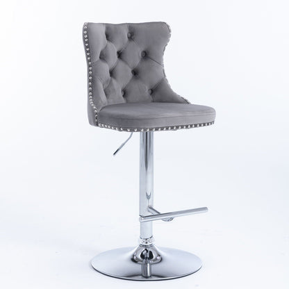 Set of 2 swivel barstools with tufted gray upholstery, chrome pedestal base, studded trim on Tampa Home & Garden Store