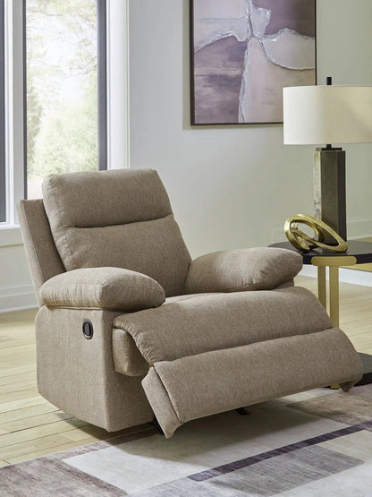 Side-Swipe Rocker Recliner beige fabric with lever in a bright living room on Tampa Home & Garden Store