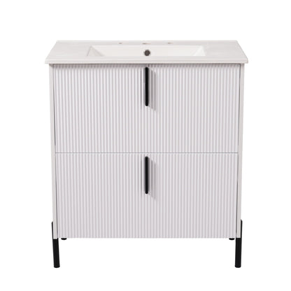 Vanity with ceramic sink and fluted white cabinet by HouseOfZazla, dark green accents on Tampa Home & Garden Store