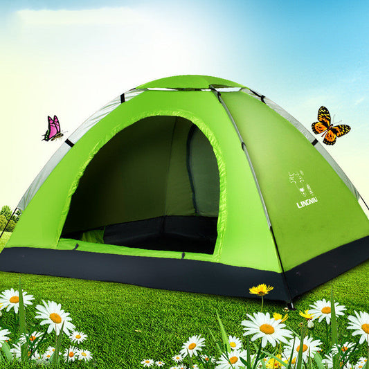 Green single-layer camping tent with open doorway on a grassy field with daisies on Tampa Home & Garden Store