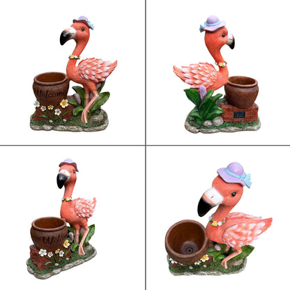 Outdoor Flamingo Flower Pot Planter statue; pink flamingo with purple hat beside brown pot on Tampa Home & Garden Store