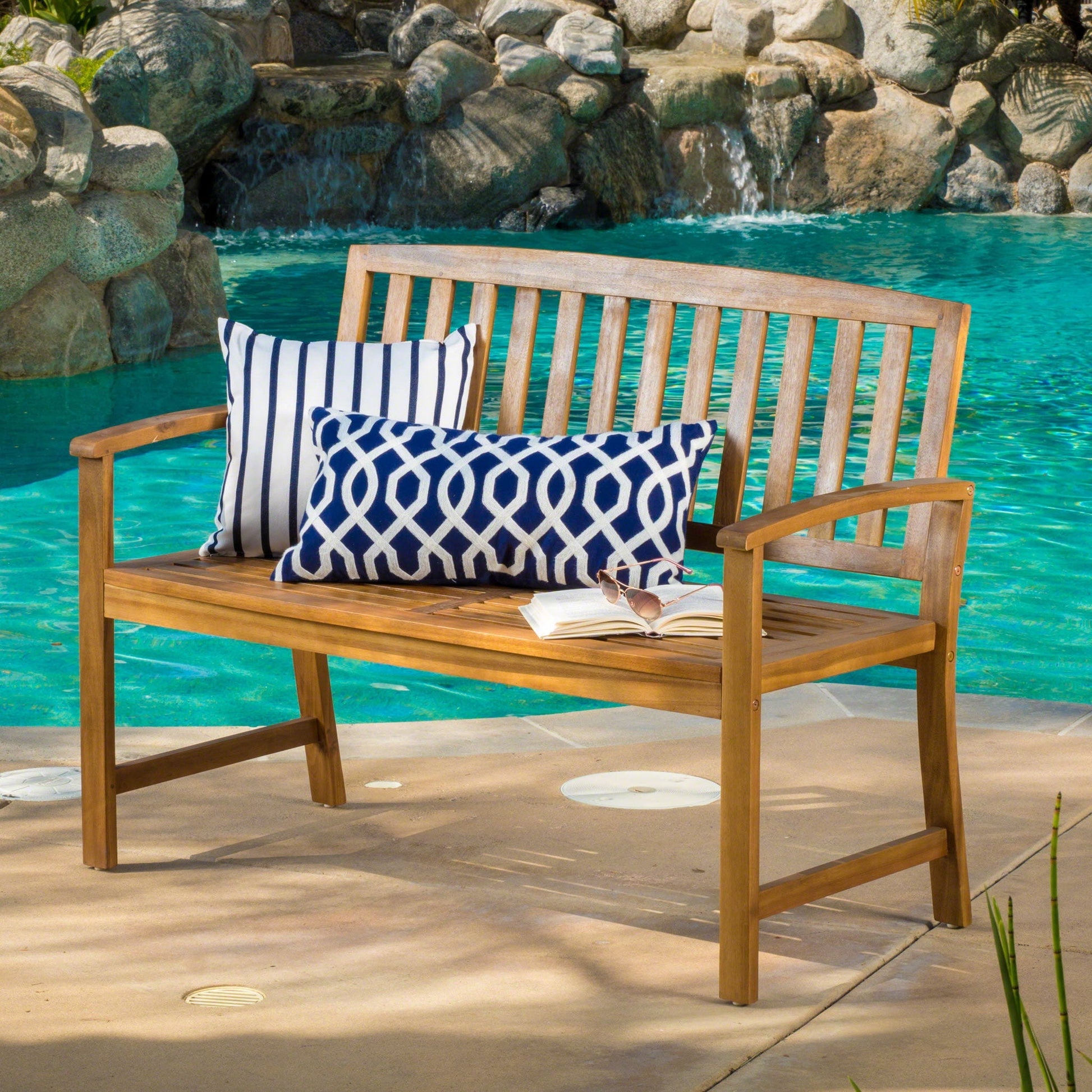 Farmhouse Loja outdoor bench in natural wood with two navy and white cushions on Tampa Home & Garden Store