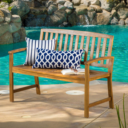 Farmhouse Loja outdoor bench in natural wood with two navy and white cushions on Tampa Home & Garden Store