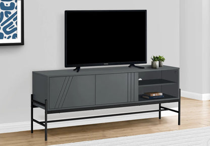 TV stand console by Unique Piece Furniture in dark gray with storage and metal frame Samsung TV on top on Tampa Home & Garden Store