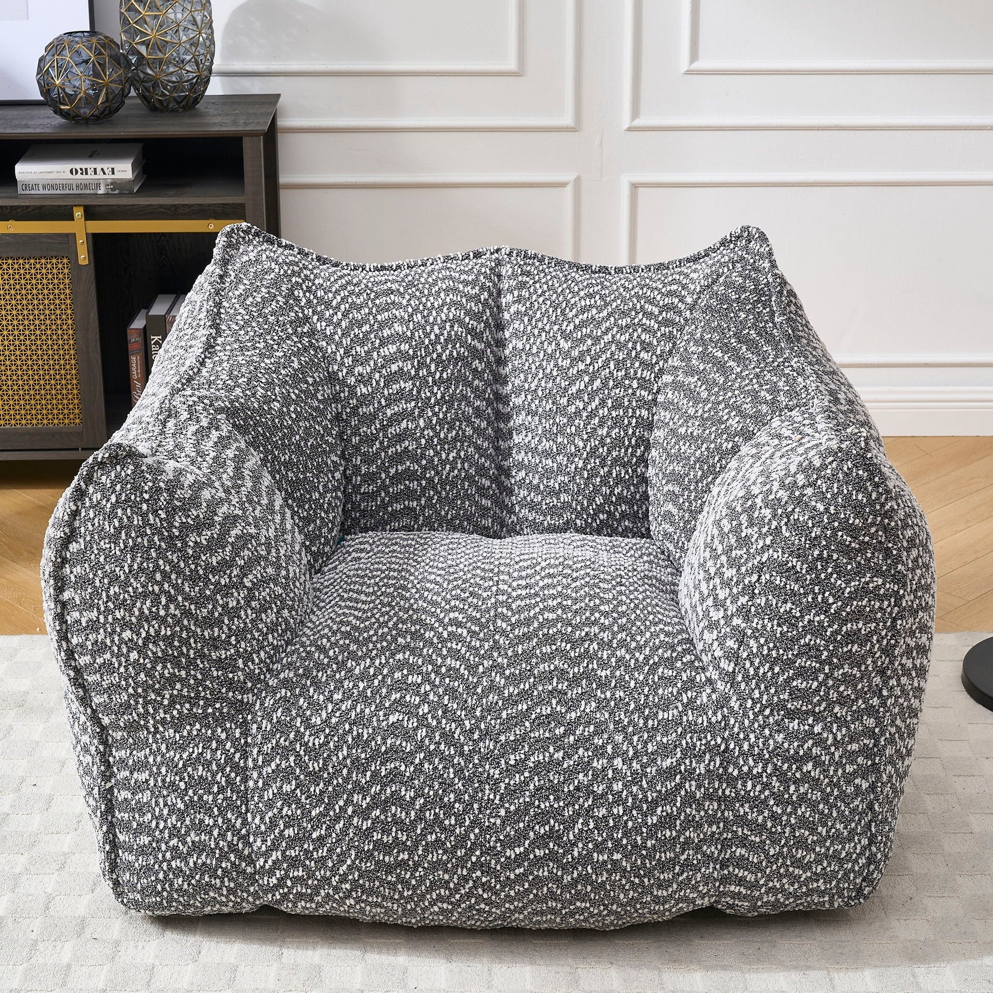 Comfortable chenille arm chairs with highly resilient foam in black-white speckled fabric on Tampa Home & Garden Store