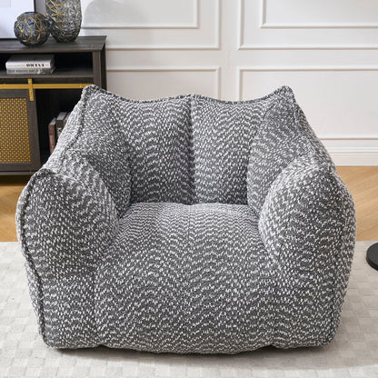 Comfortable chenille arm chairs with highly resilient foam in black-white speckled fabric on Tampa Home & Garden Store