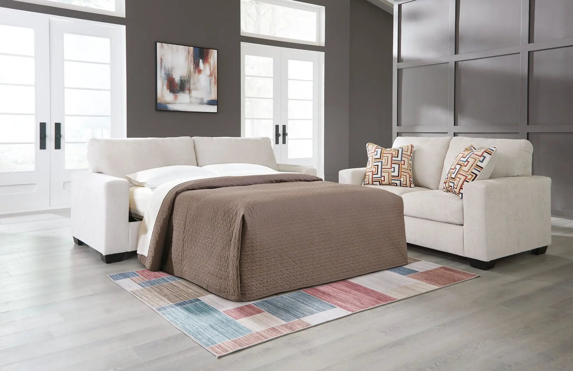 Aviemore Sofa Sleeper Unique Piece Furniture beige fabric in a gray living room on Tampa Home & Garden Store