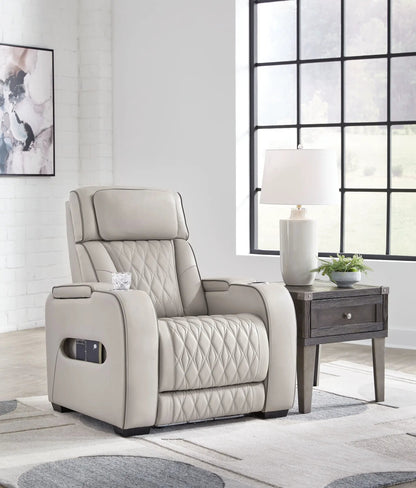 Boyington power recliner with adjustable headrest in light grey quilted leather on Tampa Home & Garden Store