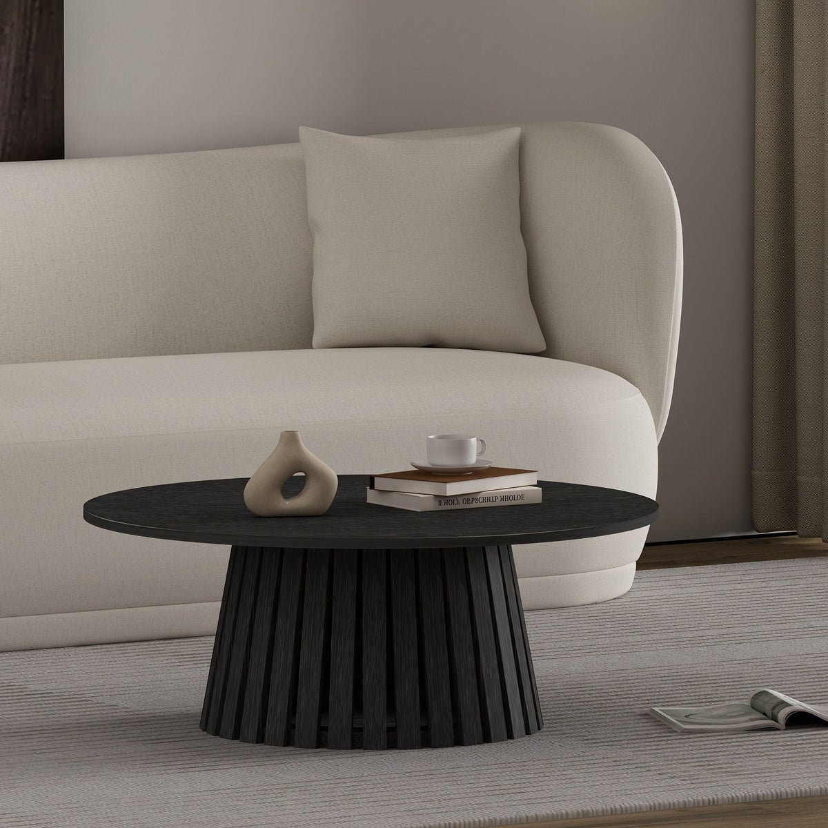 Layla end table in dark wood grain with round top and ribbed base, 2 books and a cup on Tampa Home & Garden Store