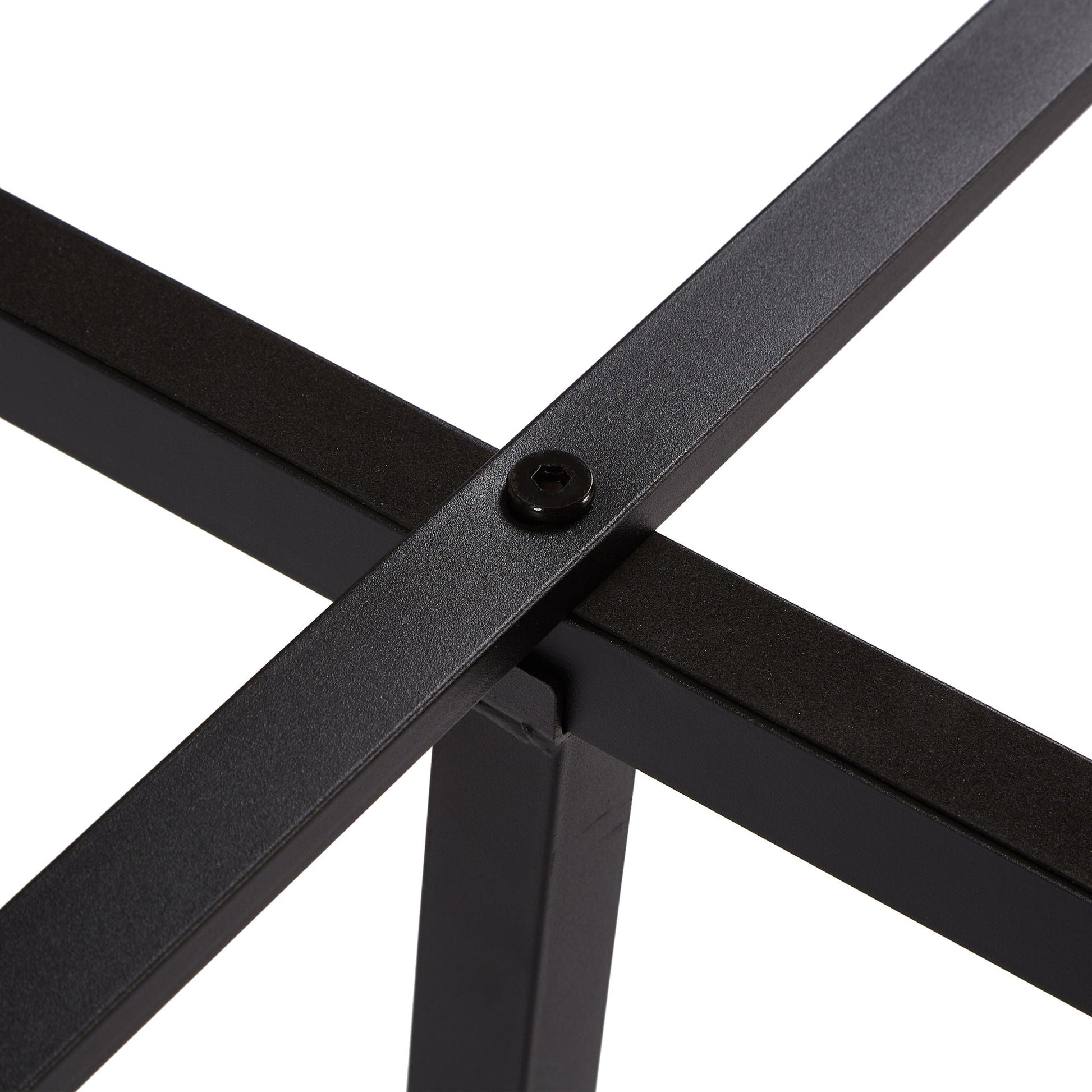 Close-up view of black metal platform bed frame crossbars and corner joints on Tampa Home & Garden Store