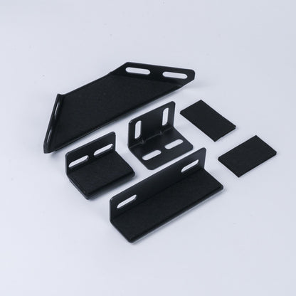 Upholstered platform bed components in black metal with slotted brackets; multi-piece set on Tampa Home & Garden Store