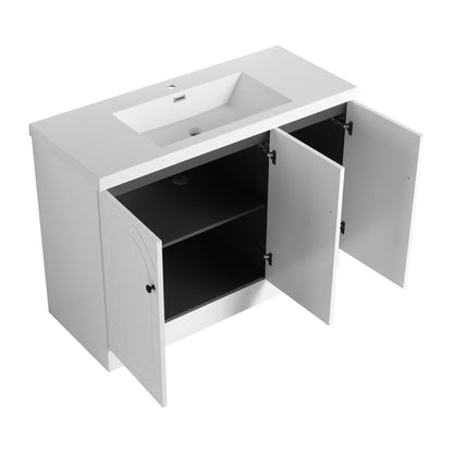 Freestanding bath vanity with white finish, resin sink, two doors open on Tampa Home & Garden Store