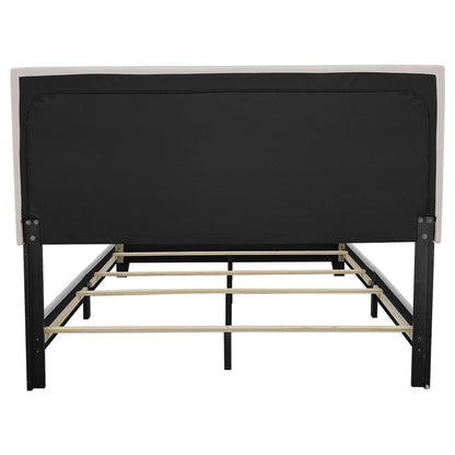 Ivory bed with nailhead trim, black upholstered headboard panel, platform bed frame on Tampa Home & Garden Store