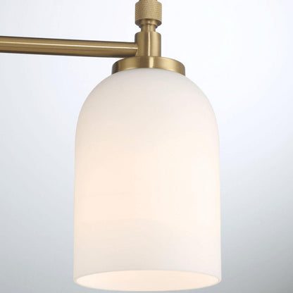 3-light vanity wall light with frosted glass shades and brass finish on Tampa Home & Garden Store