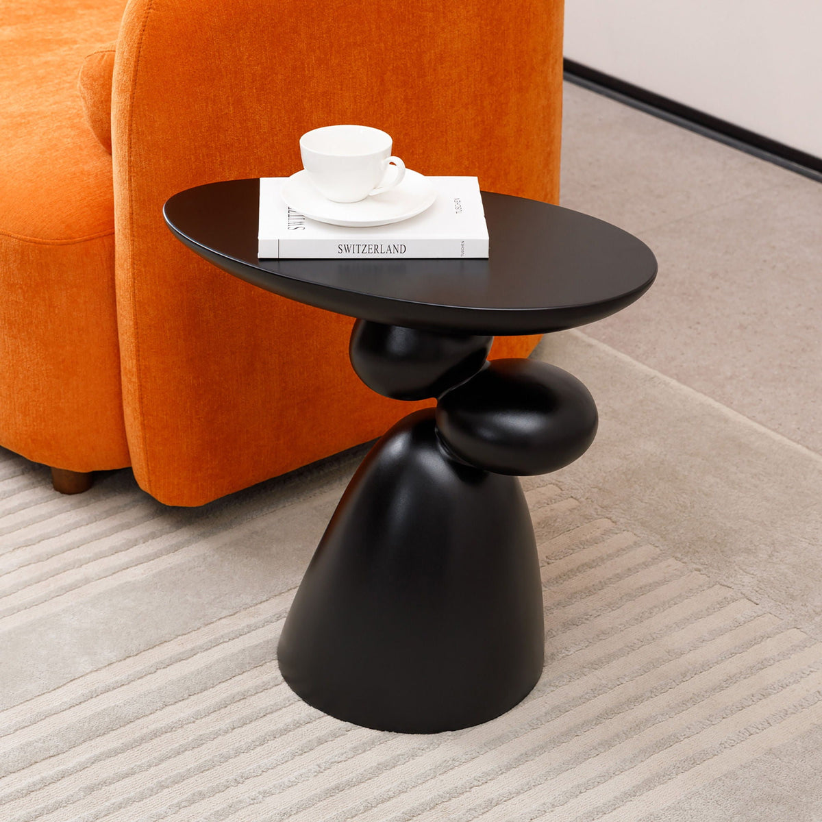 Lucky Stone Shaped End Table with sculptural black base on Tampa Home & Garden Store