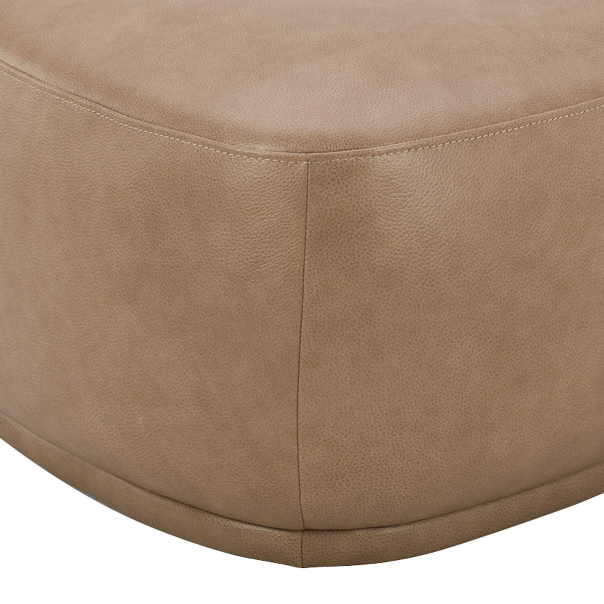 Pebble Rounded Triangle Cocktail Ottoman, upholstered tan leather with stitching on Tampa Home & Garden Store