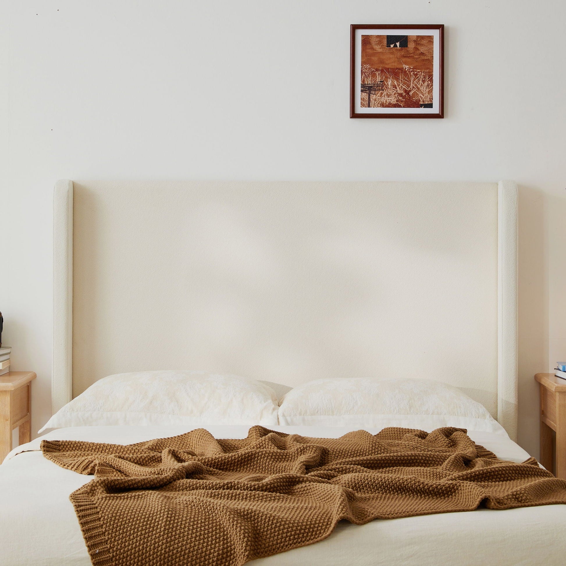 Carmen king size ivory upholstered wingback bed by HouseOfZazla; headboard with brown throw on Tampa Home & Garden Store