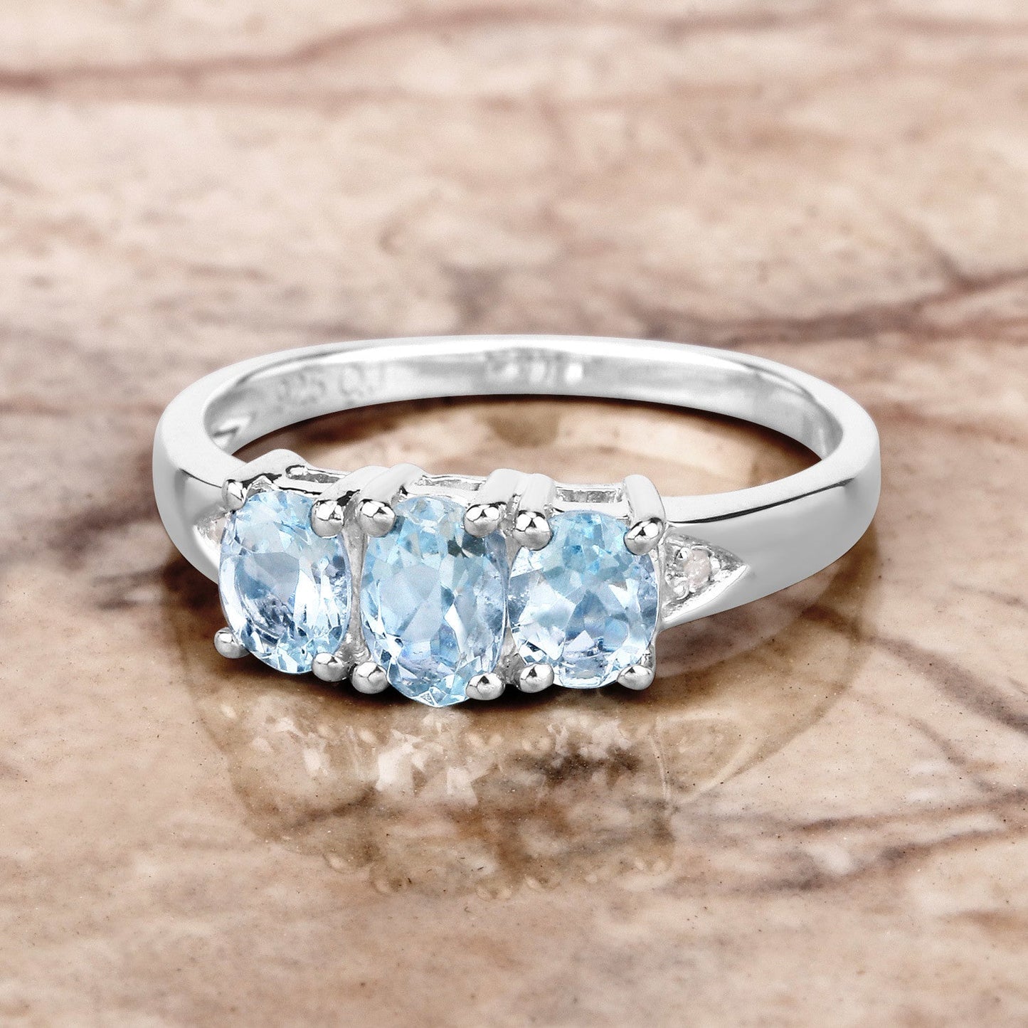 Three-stone aquamarine and diamond ring in .925 sterling silver, 0.95ct aquamarine on Tampa Home & Garden Store