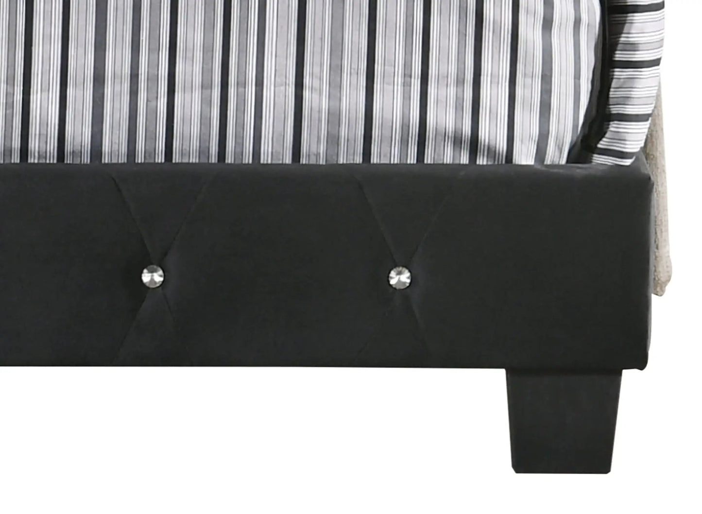 Luxurious Upholstered Bed with black tufted headboard and silver button accents, bedding on Tampa Home & Garden Store