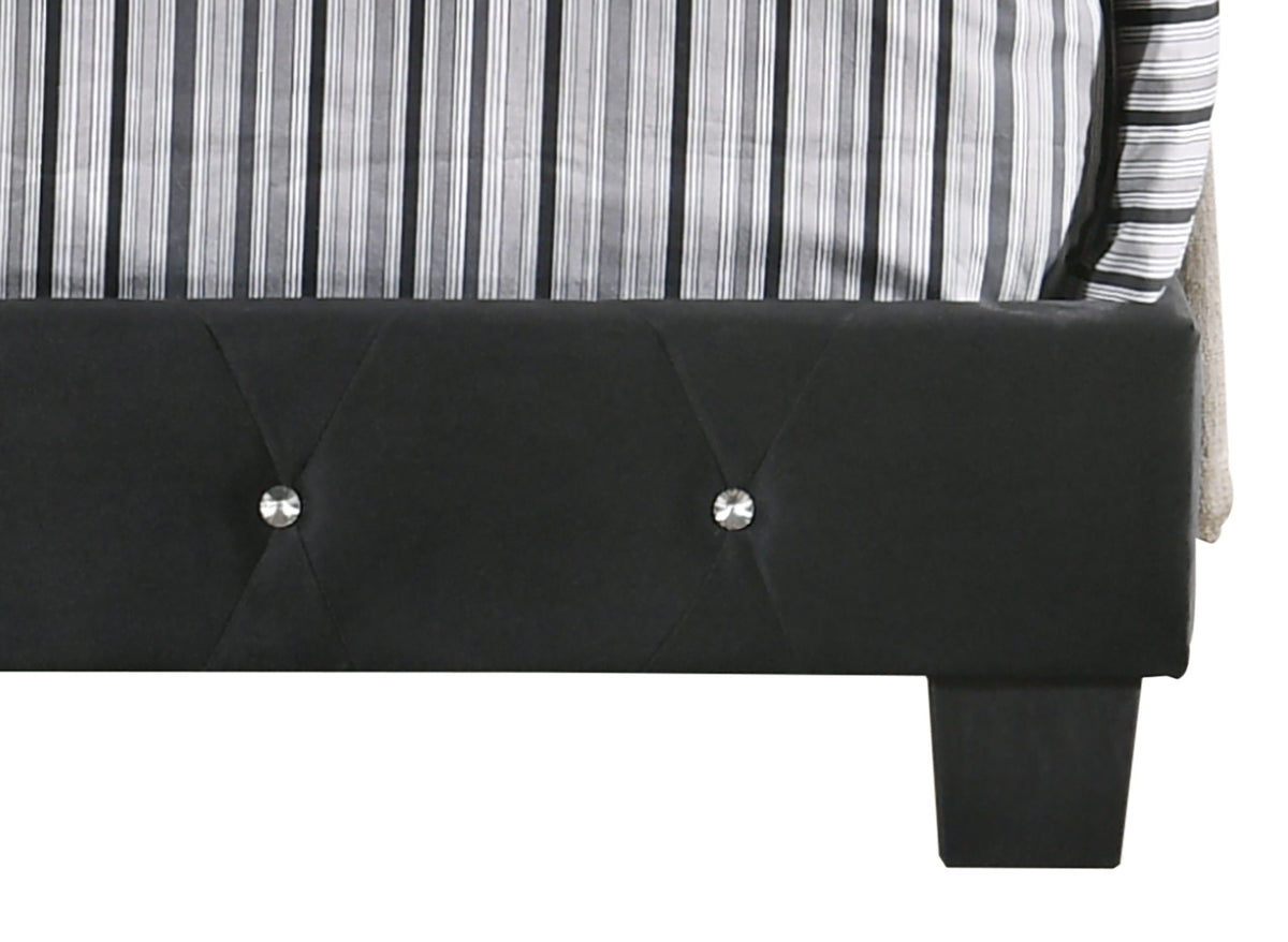 Luxurious Upholstered Bed with black tufted headboard and crystal buttons, striped gray bedding on Tampa Home & Garden Store
