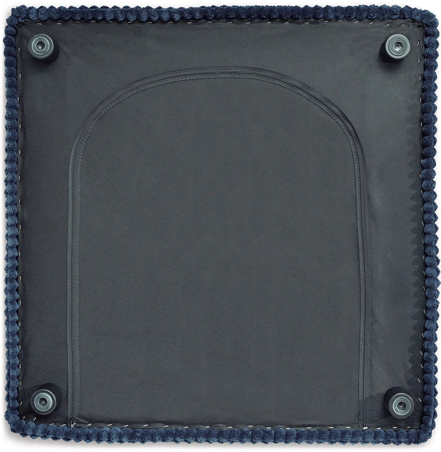 Bales Sectional bottom view in dark fabric with navy pom-pom trim and feet on Tampa Home & Garden Store