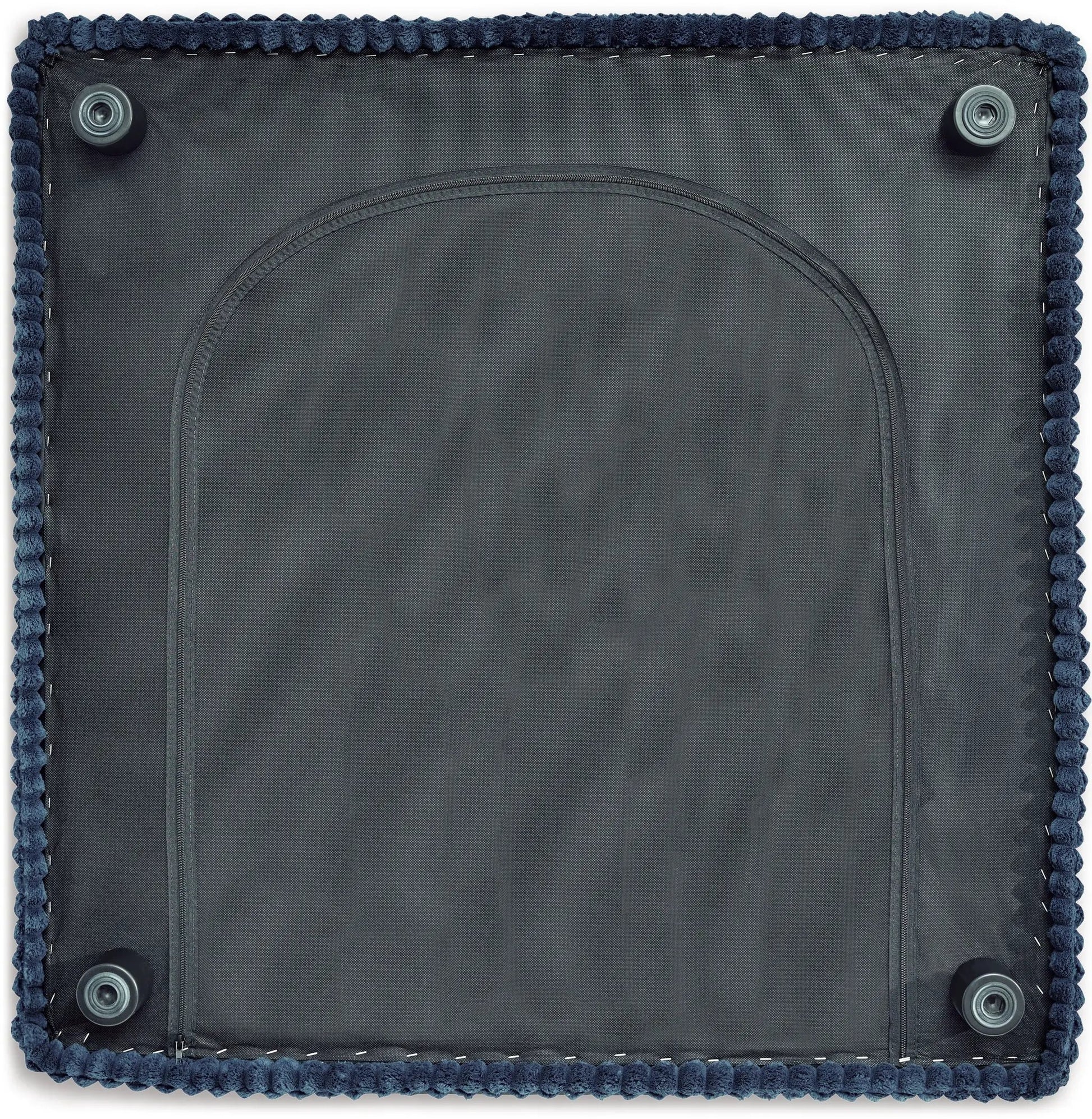 Bales Sectional bottom view in dark fabric with navy pom-pom trim and feet on Tampa Home & Garden Store