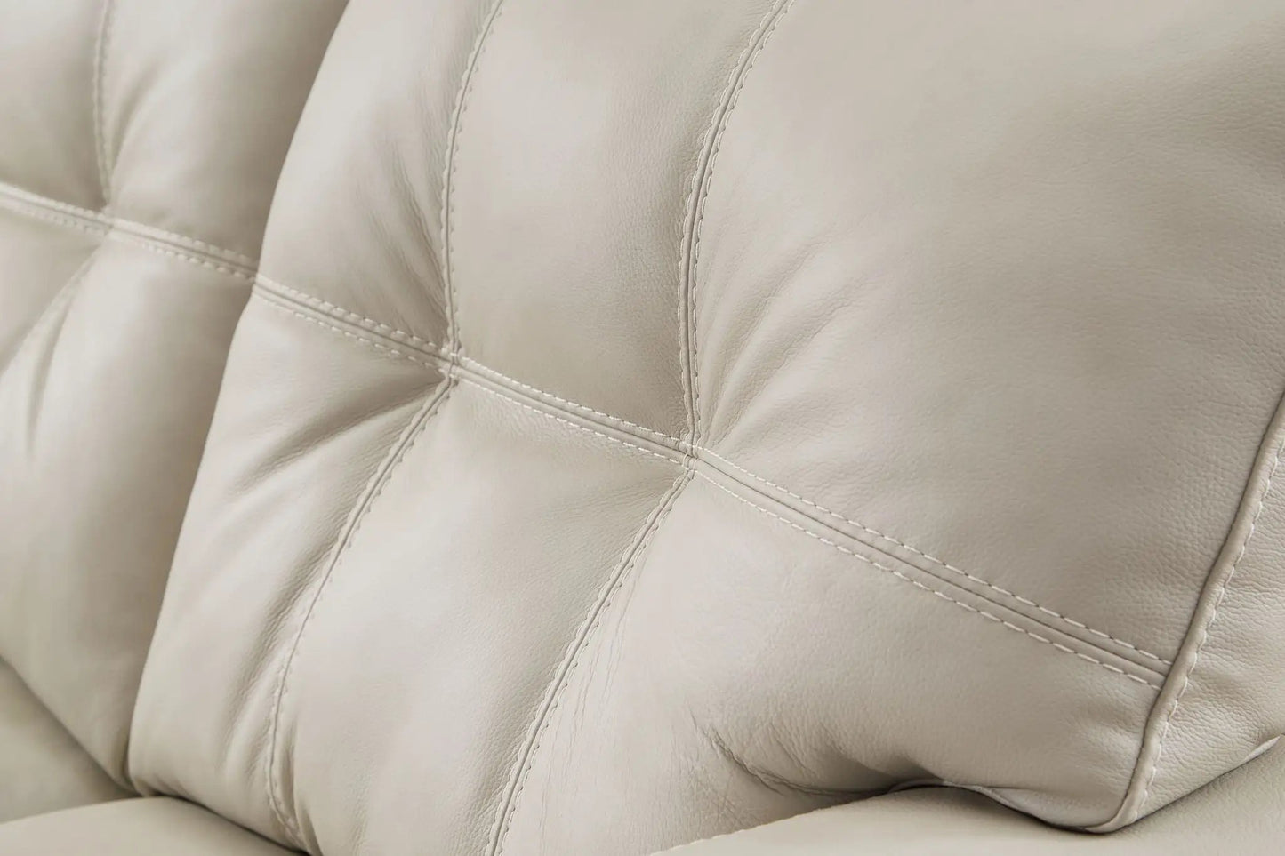 Santorine Sofa Sleeper cream leather upholstery with stitched grid panels on Tampa Home & Garden Store