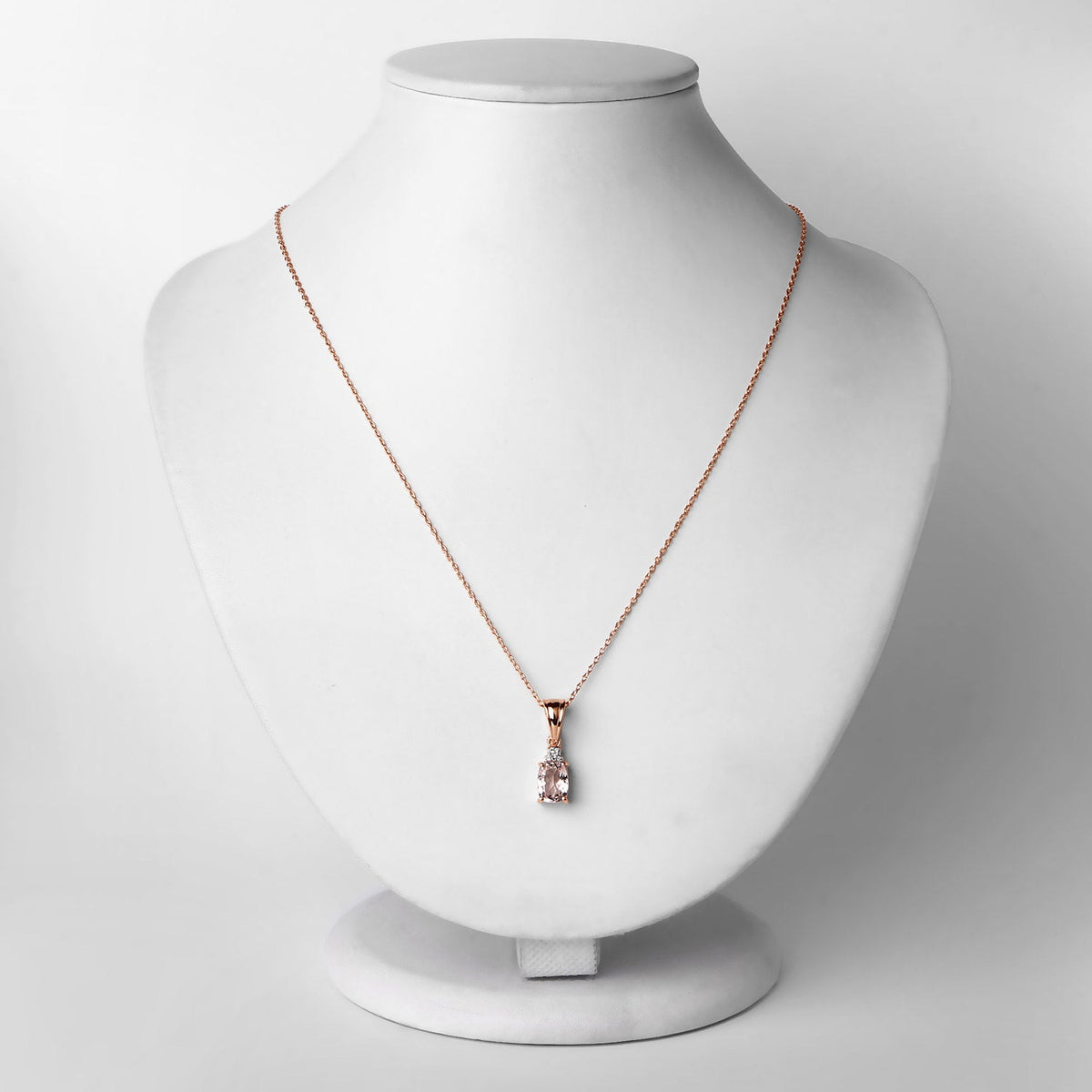 Rose gold pendant necklace with pink Morganite and white topaz set on a delicate chain on Tampa Home & Garden Store
