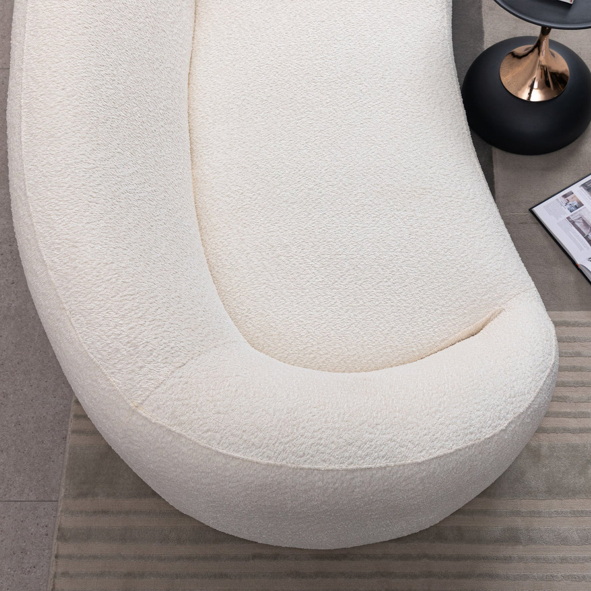 Minimalist curved 3-seater sofa in cream boucle fabric on Tampa Home & Garden Store
