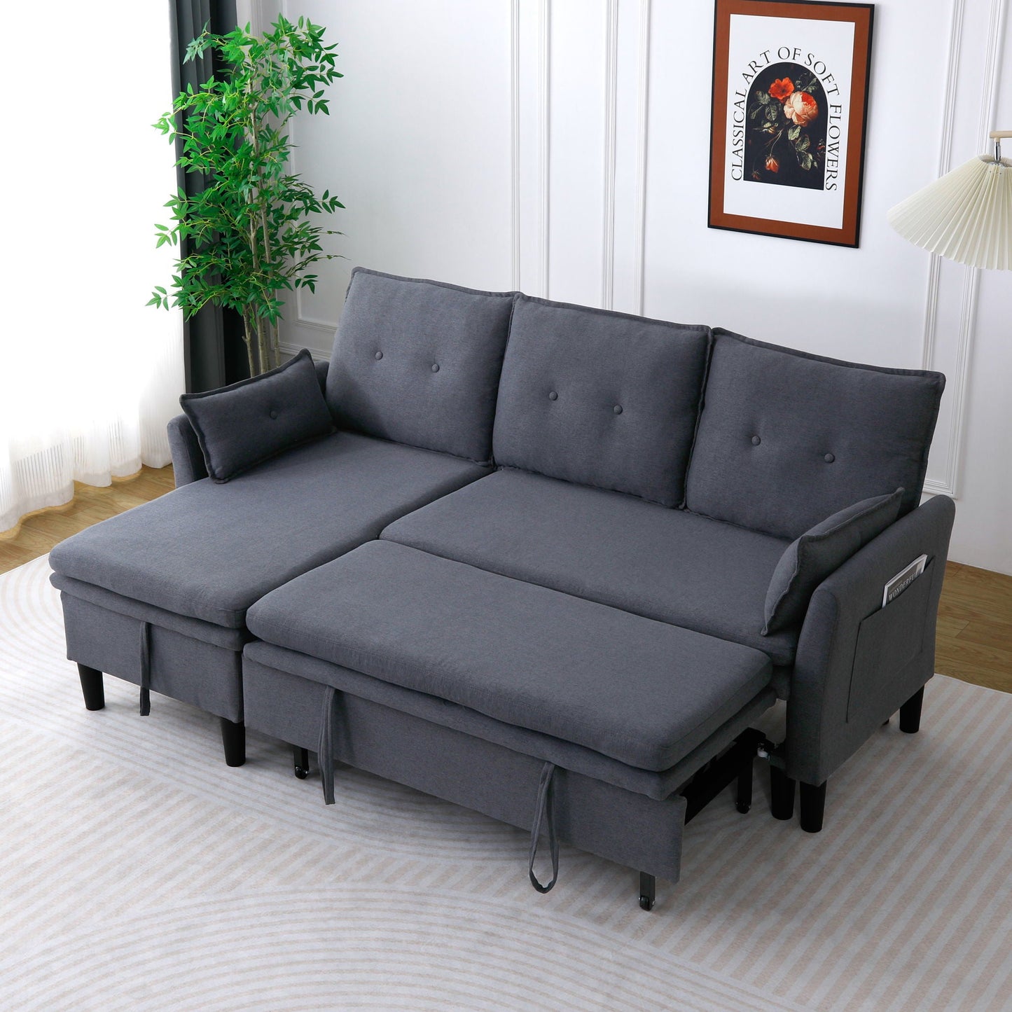 L-shaped reversible chaise sectional sofa in gray fabric with tufted cushions on Tampa Home & Garden Store