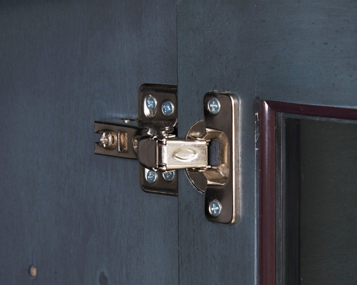 TV stand hinge close-up on blue wood panel on Tampa Home & Garden Store