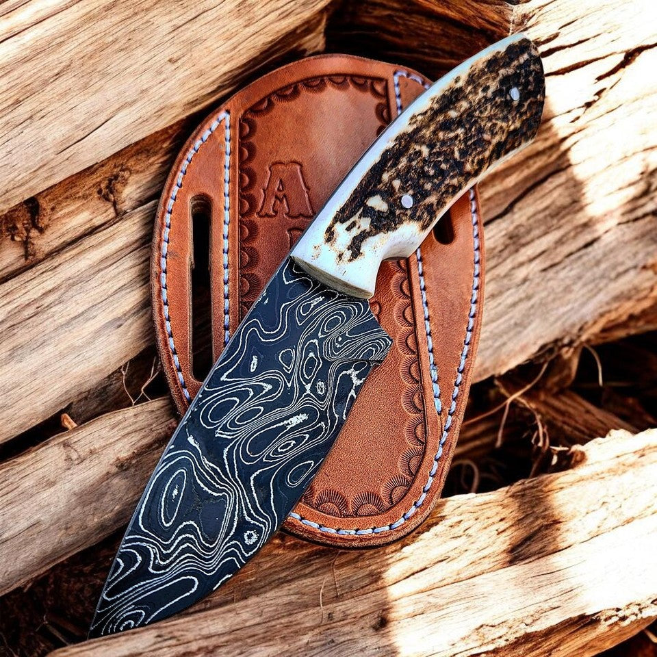 Stag Frontier Damascus fixed-blade knife with stag horn handle and leather sheath on Tampa Home & Garden Store