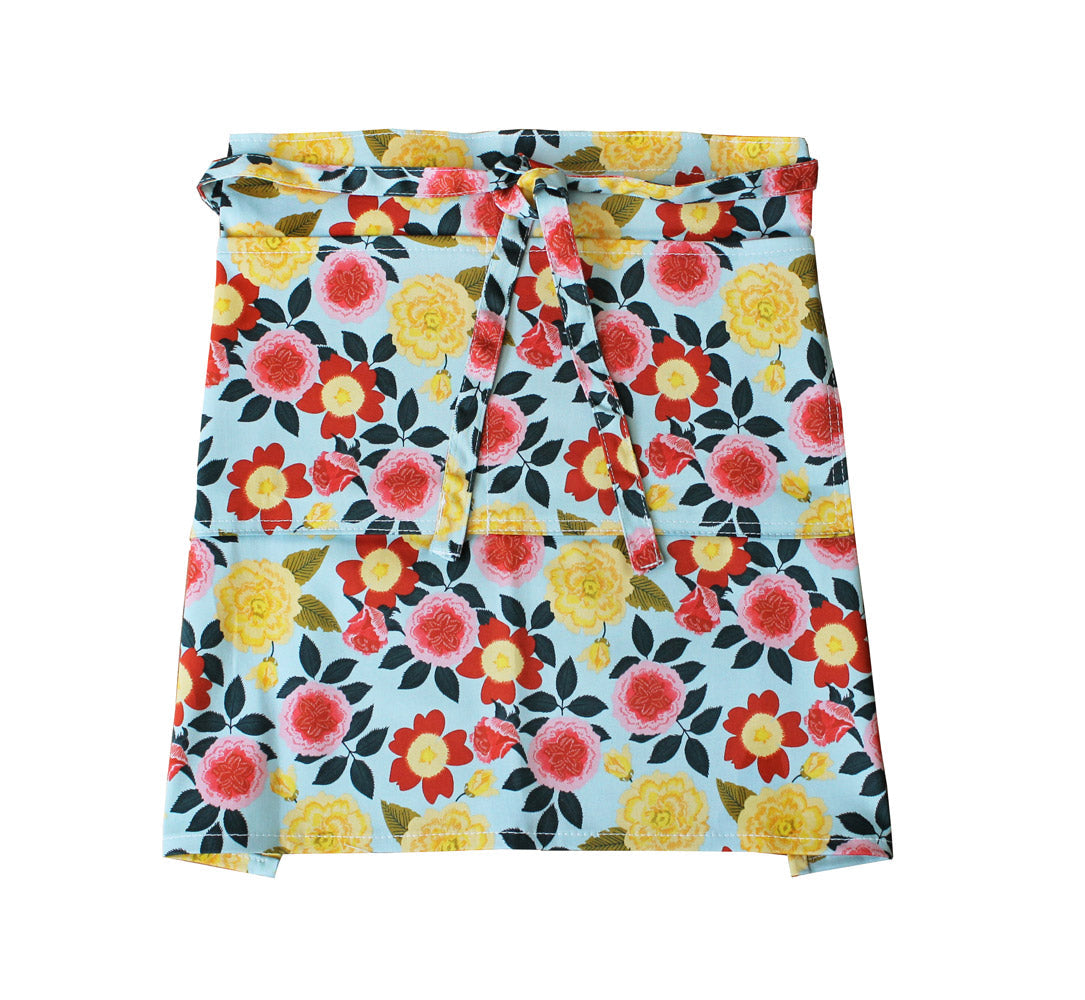 Gardener's Half Apron Womanswork, blue floral print with yellow/red flowers, tie waist on Tampa Home & Garden Store