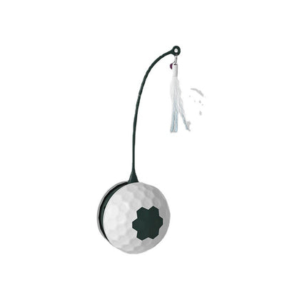 Cat chew toy ball with white dimpled surface and dark green patch, tether with tassel on Tampa Home & Garden Store