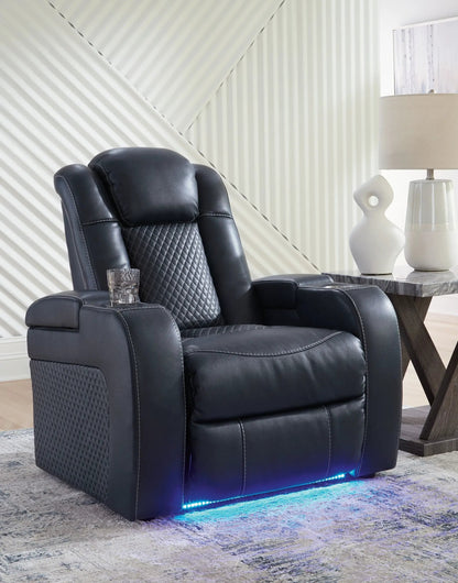 Fyne-dyme power recliner with adjustable headrest in black leather, quilted seat, blue LED base on Tampa Home & Garden Store