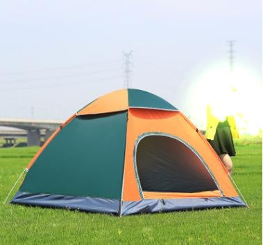 Camping tent orange and teal with blue floor on grass on Tampa Home & Garden Store