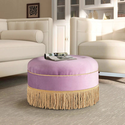 Yolanda Round Upholstered Accent Ottoman, purple cushion atop beige base with woven fringe on Tampa Home & Garden Store