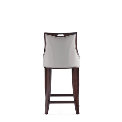 Emperor bar height barstool with backrest in gray upholstery and dark wood frame on Tampa Home & Garden Store